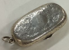 An engraved silver double sovereign case.