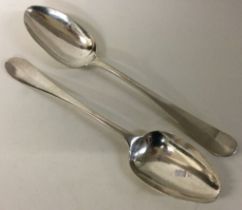 A pair of American Provincial silver spoons.