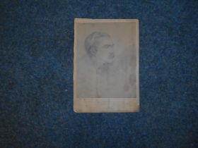 BOOKS: RUDYARD KIPLING: A faintly signed photograph reproduction of a drawing of Rudyard Kipling.