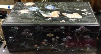 An attractive Continental lacquered writing slope decorated with MOP birds to floral front.