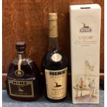 A boxed 100 cl bottle of Hine VSOP Fine Champagne Cognac; together with a 100 cl bottle.