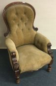 A mahogany framed button back armchair. Est. £30 -