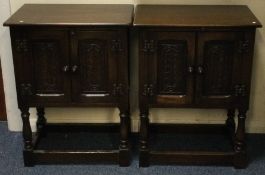 A good pair of carved oak bedside cabinets. Est. £