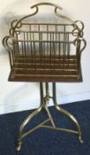 A good stylish Arts and Crafts brass revolving paper rack.