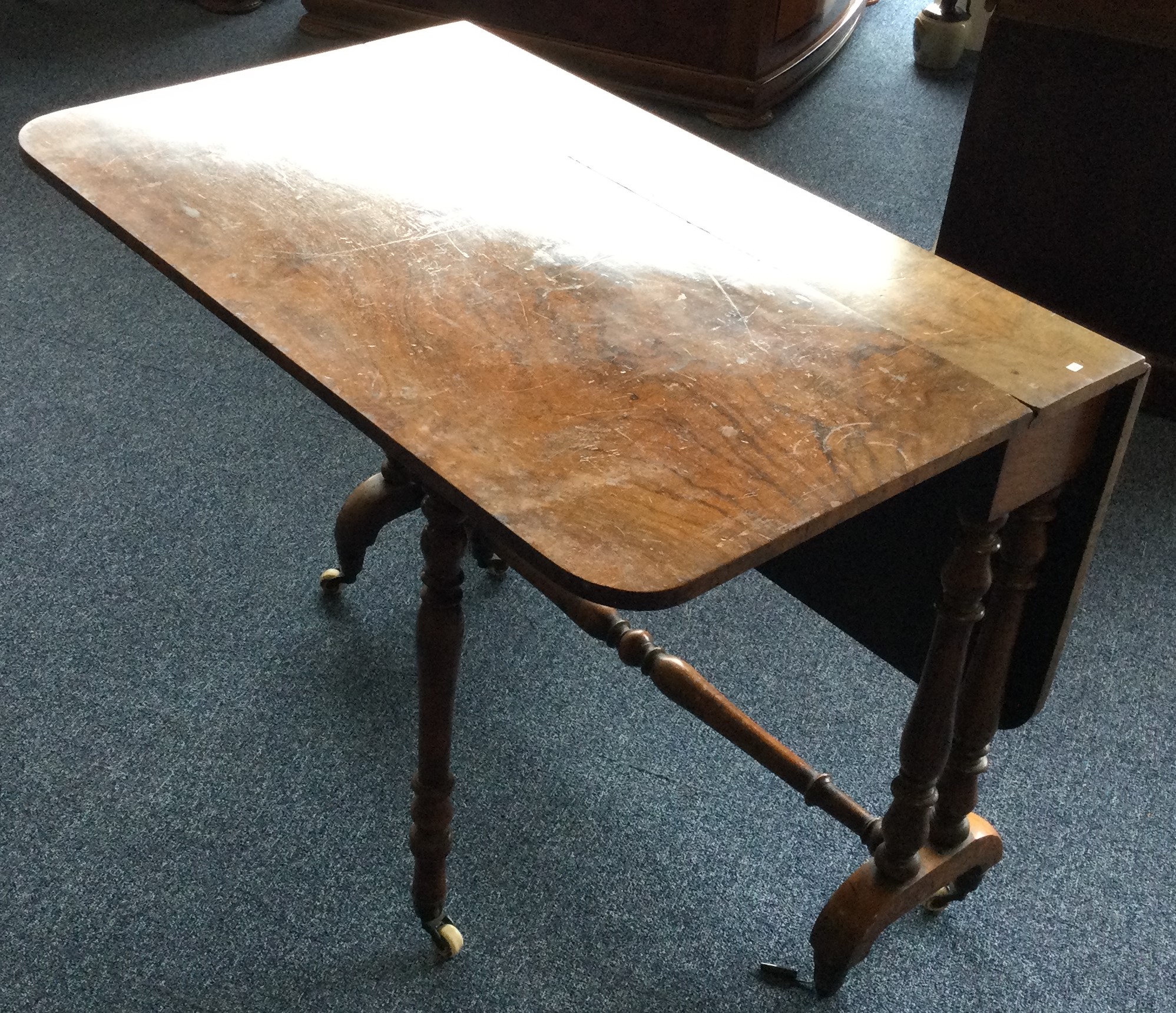 A good walnut Sutherland table.