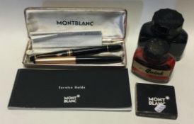 MONTBLANC: A cased fountain pen together with one other.