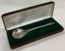 A cased English silver Christmas spoon.