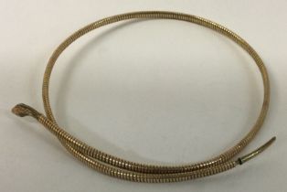 A 9 carat snake necklace.