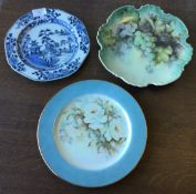 A Chinese Nanking blue and white plate together with two others.
