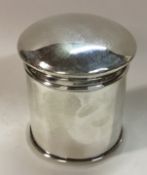 A clean silver biscuit box with lift-off lid.