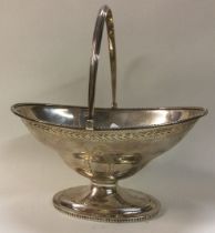 PETER AND ANN BATEMAN: A Georgian silver swing handled basket.