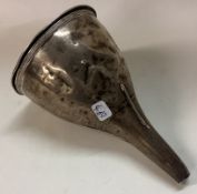 A George III silver wine funnel.