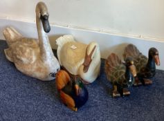 A collection of wooden painted birds. Est. £20 - £