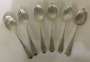 A heavy set of six bright-cut silver teaspoons.