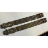 A pair of British Dragoons Household Cavalry brass and leather breast plate shoulder straps.
