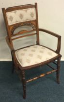 A small Victorian carver chair.