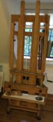 A good quality large artist easel with ratchet mechanism.
