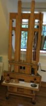 A good quality large artist easel with ratchet mechanism.