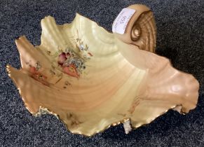 A large Royal Worcester shell shaped dish with gilded border.