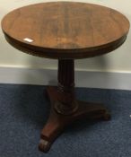 A good quality rosewood twin pedestal table on sweeping supports.