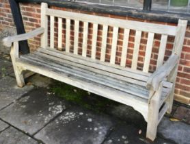 A teak garden bench.