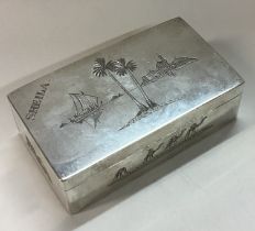 A fine Persian silver engraved snuff box with scene of a river and temple.