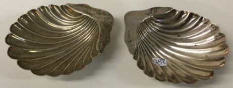 A pair of Victoria silver butter shells.