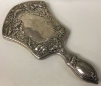 An American Sterling silver and glass mirror.