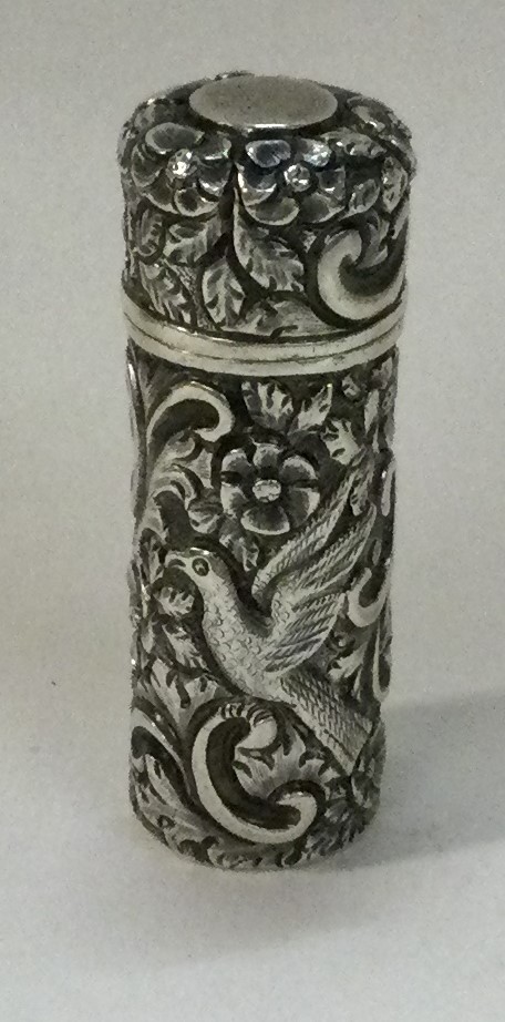 SAMPSON MORDAN AND CO: A Victorian silver chased scent bottle embossed with birds. - Image 2 of 3