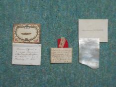 OF FRENCH ROYAL INTEREST: A small card in original envelope mounted with a lock of hair.