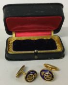 A pair of gold plated military cufflinks contained within a fitted box.