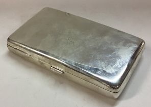 A large silver cigarette case.