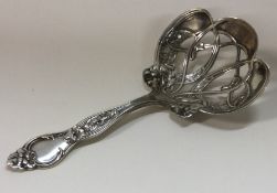 An American pierced silver spoon.