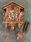 An old carved cuckoo clock.