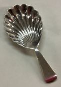 EXETER: A Georgian silver fluted caddy spoon.