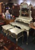 A good painted silver dressing table with mirrored back together with matching bedside cabinets.