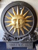 A massive good quality cast iron Sun Life advertising sign attractively cast with flowers.