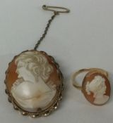 A small gold framed cameo together with matching ring.