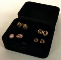 A box containing 9 carat mounted ear studs.