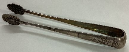 A fine pair of 19th Century Russian silver tongs.