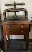 A Victorian mahogany book press with steel mount.