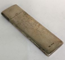 A large rectangular silver cigarette case with lift-off cover.