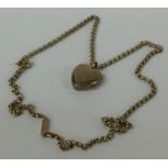 A 9 carat heart shaped locket on fine link chain.