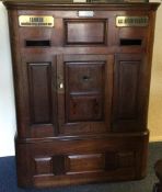 An unusual mahogany hotel letter box with brass panelled decoration to lockable front.