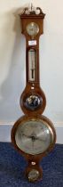 A Georgian mahogany banjo barometer of typical for