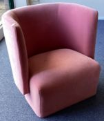 A stylish Arts and Crafts armchair in pink ground.