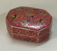 An Indian silver and pink enamel hinged box.