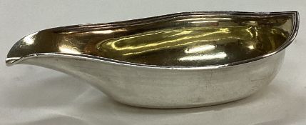 An 18th Century George III silver pap boat with gilt interior.