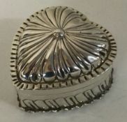 A Victorian silver heart shaped box.