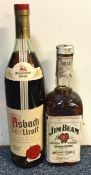 A 1 litre bottle of Asbrach Uralt German Brandy together with a 750 ml bottle of Jim Beam.